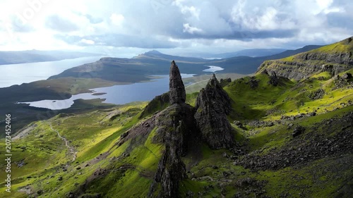 Cinematic aerial view of the iconic Old Man of Storr rock formation, Isle of Skye, Scotland
