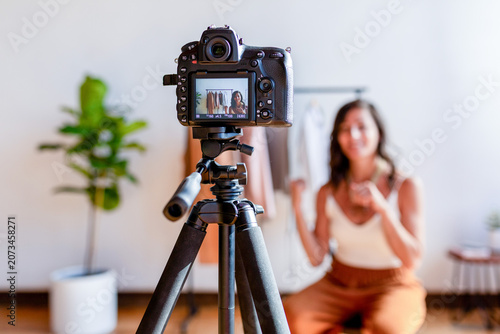 Vlogger recording content at home