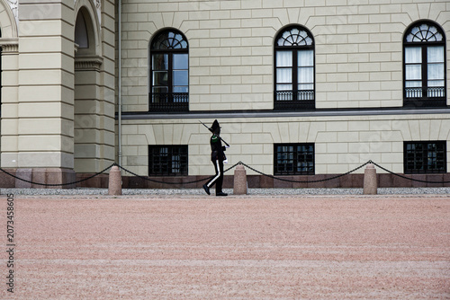 Norwegian Royal Guard Marches Past the Royal Palace in Oslo