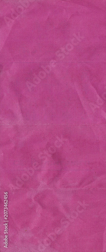 Crumpled magenta paper texture background