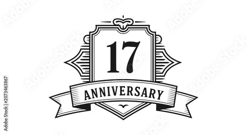 Photography Elegant black and white emblem celebrating a 17th anniversary with decorative flourishes and a banner