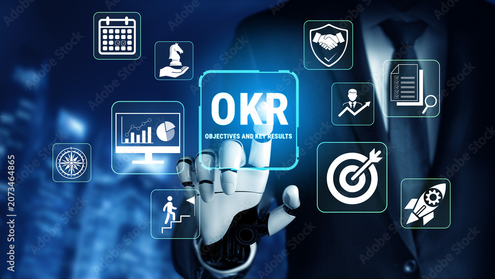Obraz premium Futuristic Businessman Interacting with OKR Framework and Digital Icons Representing Performance Management, Strategy, and Key Results in a Corporate Environment Fluxor.