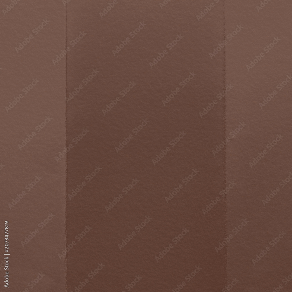 Fototapeta premium Brown textured paper with vertical folds, creating a subtle pattern.
