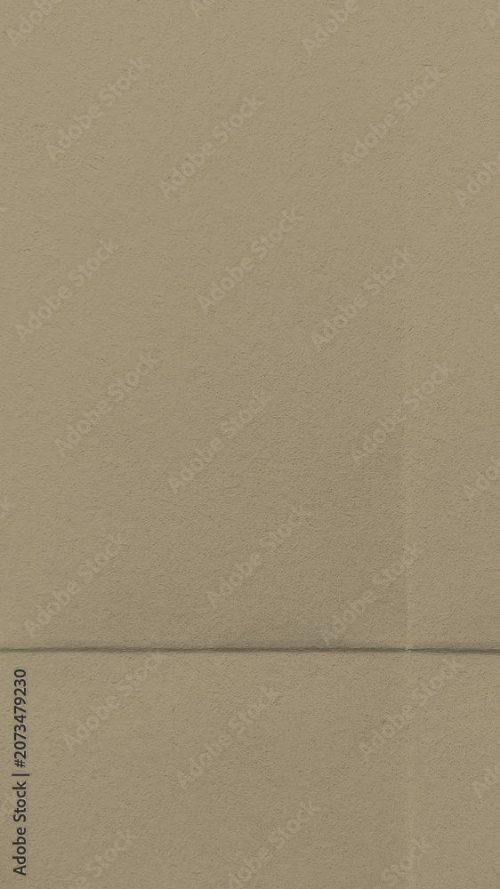 Fototapeta premium Minimalist textured beige wallpaper for mobile