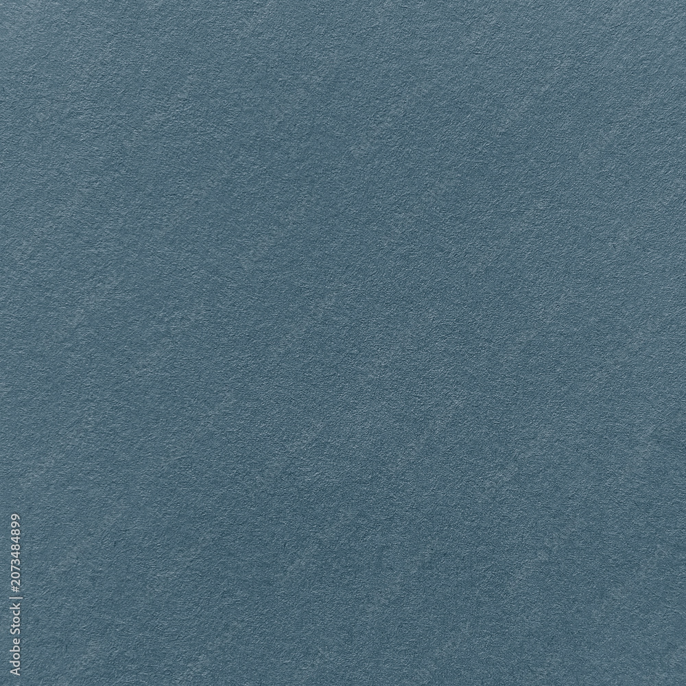 Fototapeta premium Close-up of a textured blue surface, resembling soft fabric or suede.