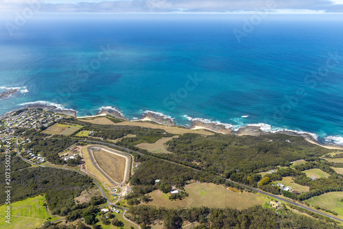 Marengo Apollo Bay aerial view of coastal cliffs and farmland and waterfront properties, Victoria Australia