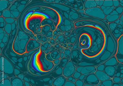 Abstract swirling fluid with rainbow gradient in macro view during fluid art creation