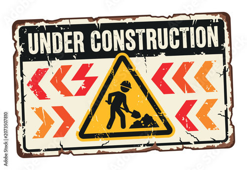 Rusty vintage under construction sign indicating work in progress, road repair, and website maintenance with a worker pictogram