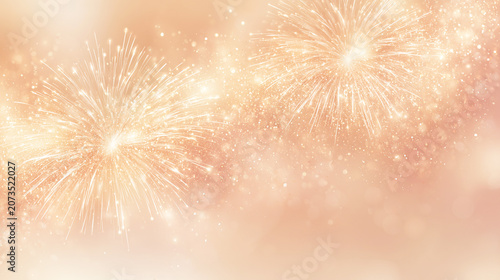 淡いゴールドの花火が広がるお祝い背景素材
