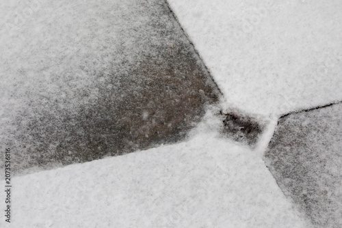 Canvastavla A backyard drain in the snow and sleet in early January, England, United Kingdom