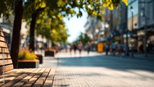 A sun-drenched city street scene is captured with a shallow depth of field, creating a blurred, impressionistic effect.