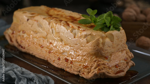 Loaf cake topped with caramel syrup and fresh mint