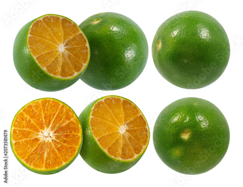 Set of fresh green orange and calamansi fruits whole and sliced isolated on white background