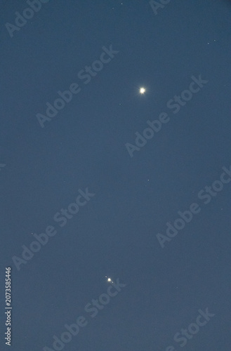 Celestial Event Showing Venus Near Jupiter and Its Moons in Night Sky