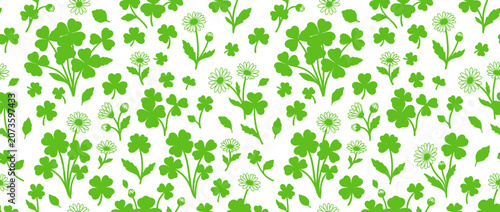 Seamless pattern of green clover leaves and small white flowers on a white background.