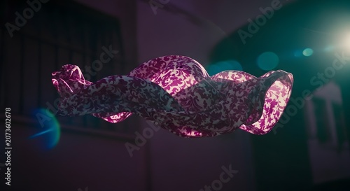 Abstract fabric-like structure floating in dimly lit urban setting