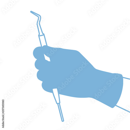 Hand holding dental pick in flat vector style