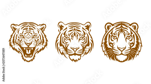 Quadro su tela Set of three stylized tiger head vector graphics showing roaring aggressive and
