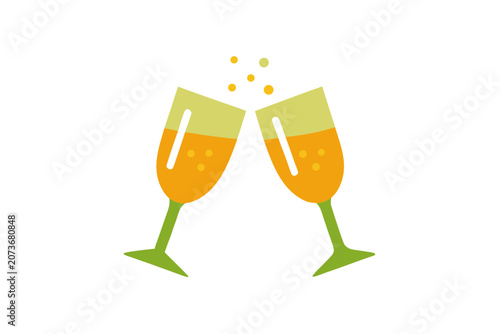 Two green stemmed champagne flutes clinking together with yellow liquid and bubbles rising