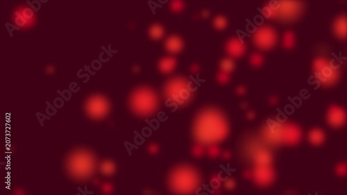 Abstract Red Bokeh Particles Floating on Dark Red Background Loop