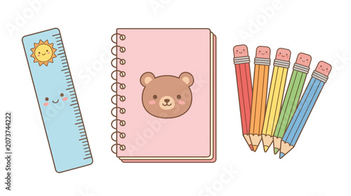 Colorful pencils and notebook with bear face next to smiling ruler on white background