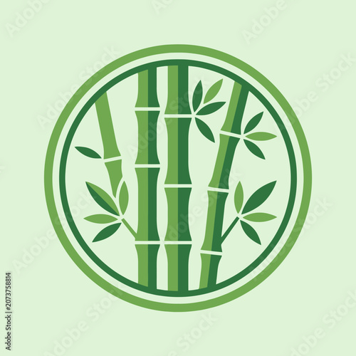 Green bamboo stalks are arranged inside a circular frame