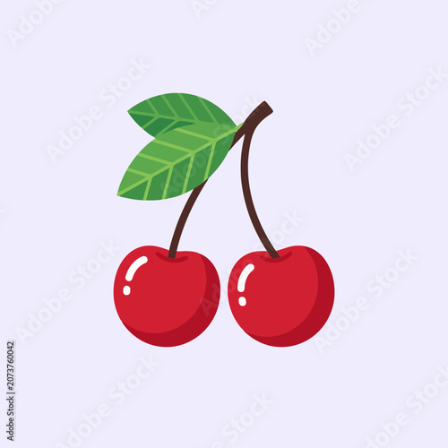 A pair of bright red cherries with green leaves on top