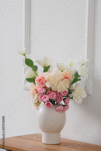 Vase with artificial flower...