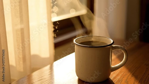 Warm Coffee Cup Glowing In Gentle Morning Sunlight