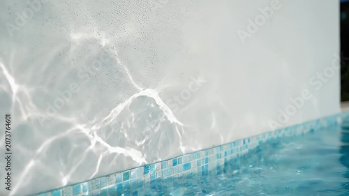 Swimming Pool Water Reflection on White Wall Seamless Loop