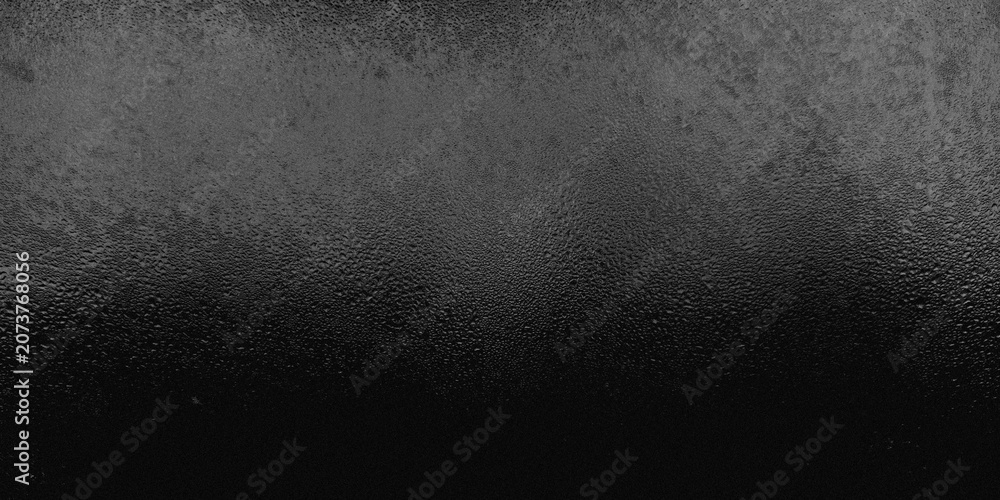 Obraz premium Dark black frosted glass texture with grainy noise and tiny condensed water rain drops. Abstract textured background with subtle top light gradient effect