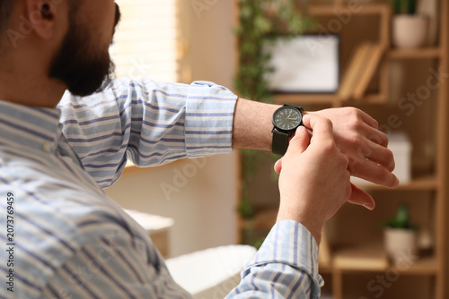 Man with stylish wristwatch...