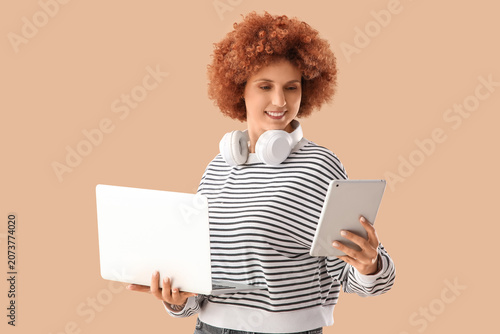Young female programmer wit...