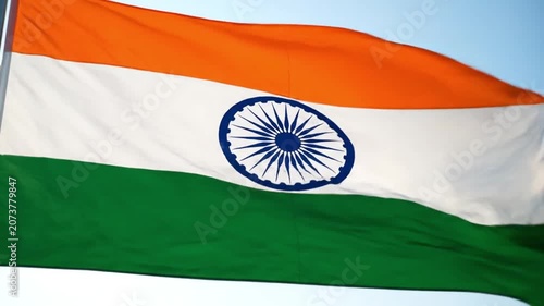 National Flag of India Waving Smoothly Against Blue Sky. 4K Video
