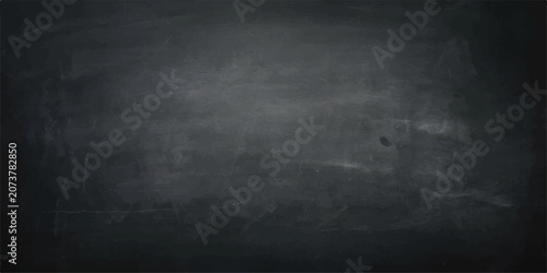 Fotografie Empty Blackboard: A clean, dusty blackboard with faint chalk marks, ready for new ideas and knowledge to be written upon
