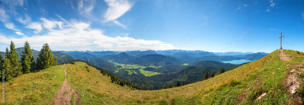 Fototapeta premium panoramic landscape, hirschhornl mountain with cross, view to Jachenau and alps, bavaria