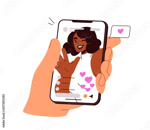 Hand holding smartphone with popular influencer on screen. Smiling content cr...