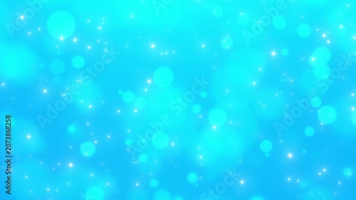 Sparkling particles abstract background.Blue glittering bokeh lights.Animation video.　青　キラキラ　玉ボケ　CG  動画　抽象的　爽やか　光る　パーティクル　豪華