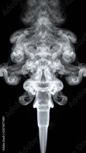 White smoke plume rises against a solid black background