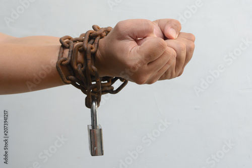 Fotografi Hands chained tightly
