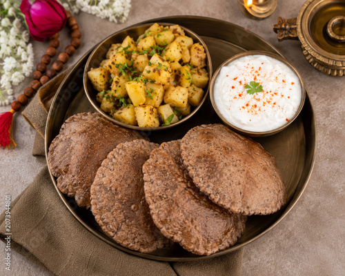 Navratri Fasting Food Platter with Kuttu Puri Potato Curry and Yogurt