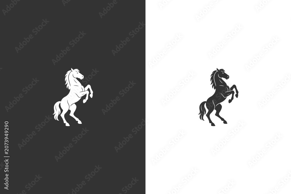 Fototapeta premium A powerful silhouette of a horse rearing up on its hind legs, presented in both black and white