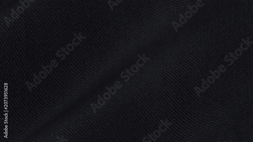 Italian Deep Black Solid Wool Suiting Fabric cascading in sleek pristine waves of smooth matte luxury texture for timeless formal evening suits