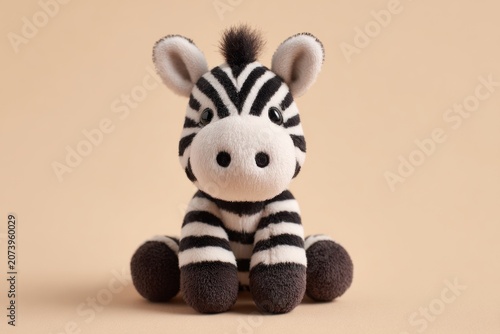 Cute Zebra Plush Toy on Beige Background