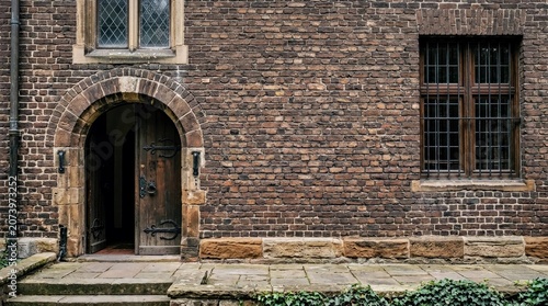 Old Brick Building With Stone Arch Doorway