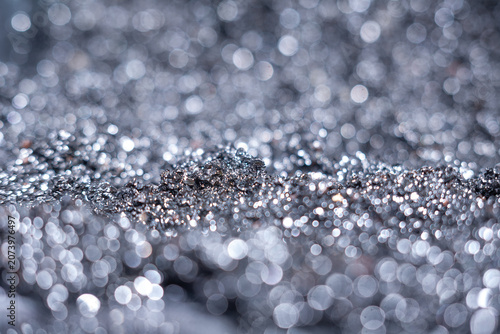 Close-up view of shiny metallic texture with blurred background