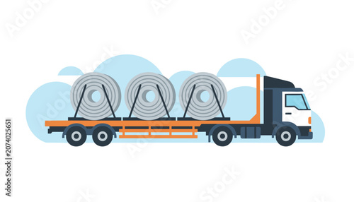 Industrial cargo truck transporting heavy steel coils on a flatbed trailer illustrating logistics and supply chain distribution for manufacturing.