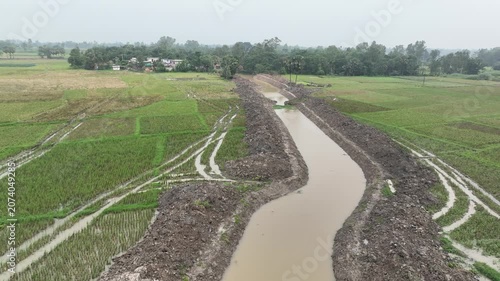 Newly constructed meandering canal for agricultural irrigation