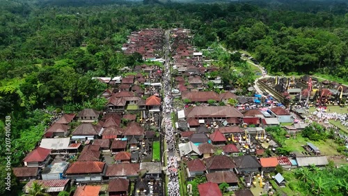 Aerial View of Balinese Hindu Ceremony in Traditional Village, Bali, Indonesia