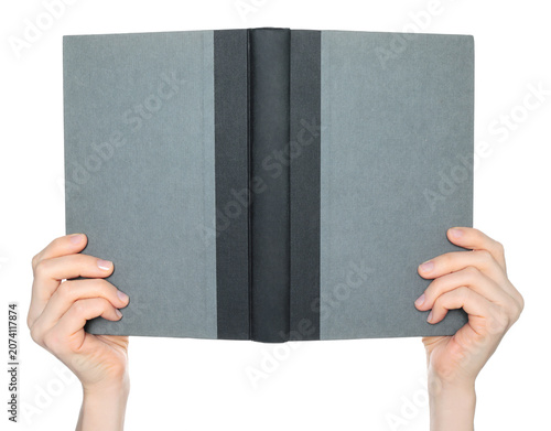 Hands holding an open book showing the blank cover, isolated on transparent background. Clean mockup template for publishing, branding, education, presentation and design